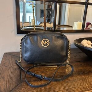 Michael Kors black pebbled leather Fulton crossbody bag